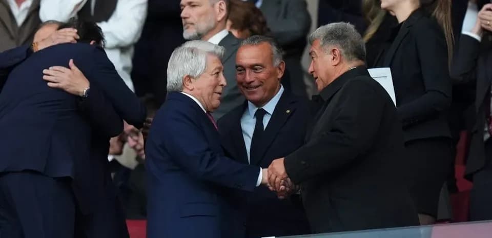 Officials greeting each other in stadium stands