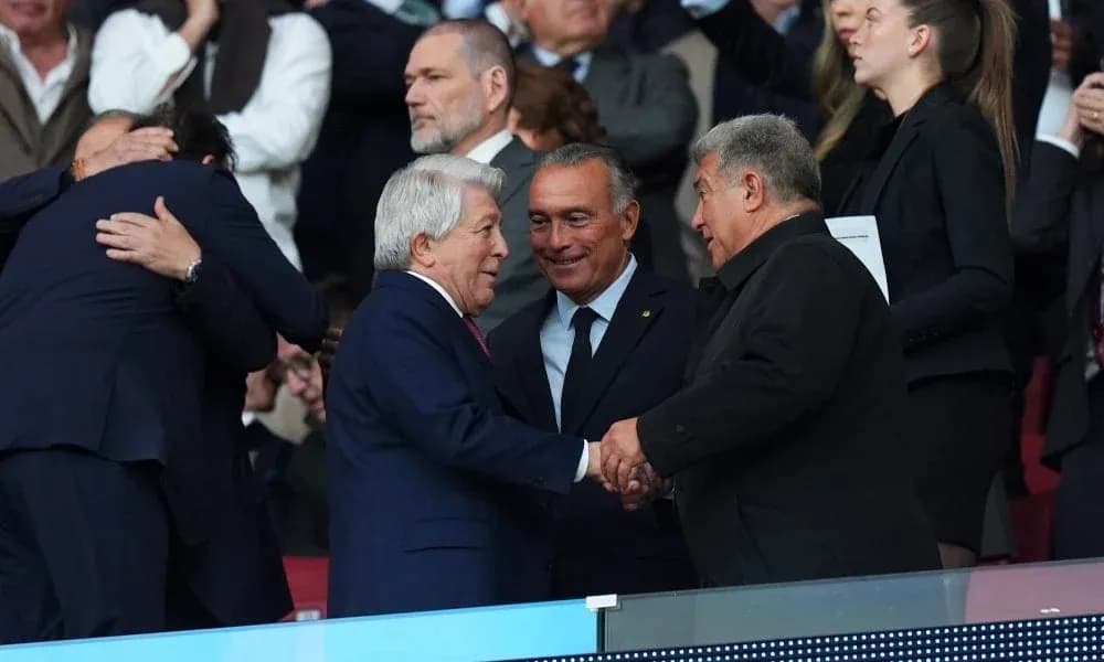 Officials greeting each other in stadium stands