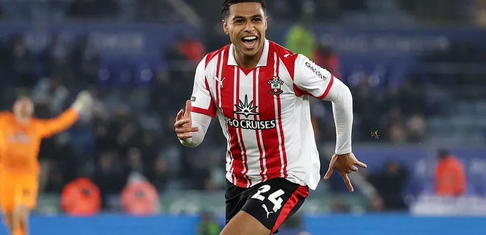 Player celebrating a goal on the pitch