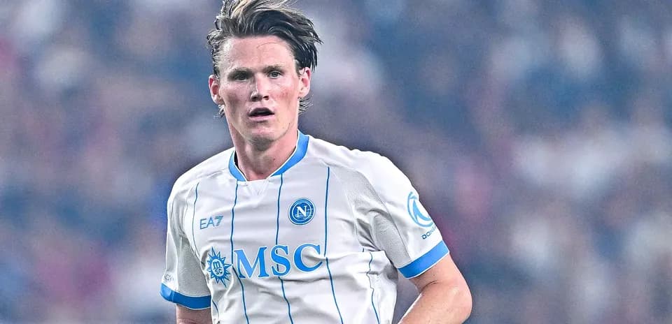 Player in Napoli jersey running on the pitch