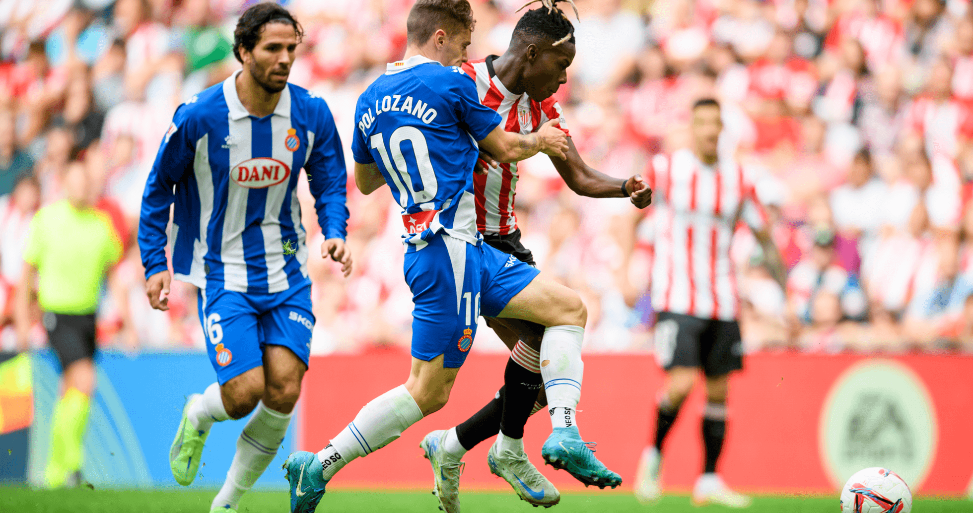 Pol Lozano tackling opponent during La Liga match