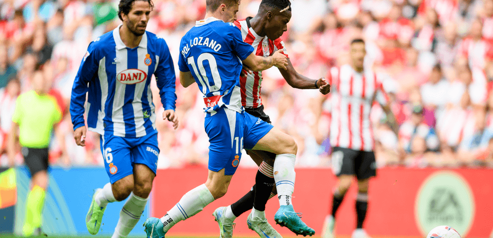 Pol Lozano tackling opponent during La Liga match