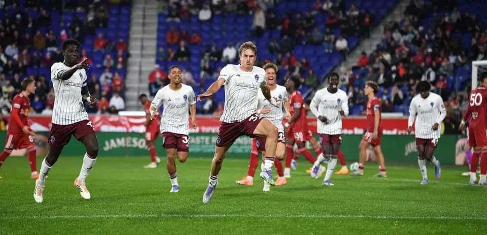 Colorado Rapids II players celebrating a goal