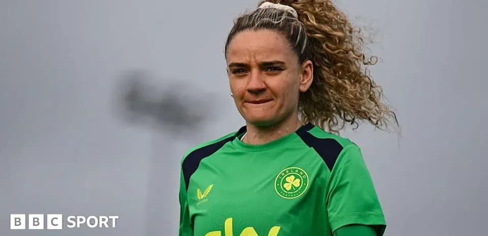 Goalkeeper in green jersey at training session
