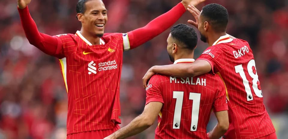 Liverpool players celebrating a goal