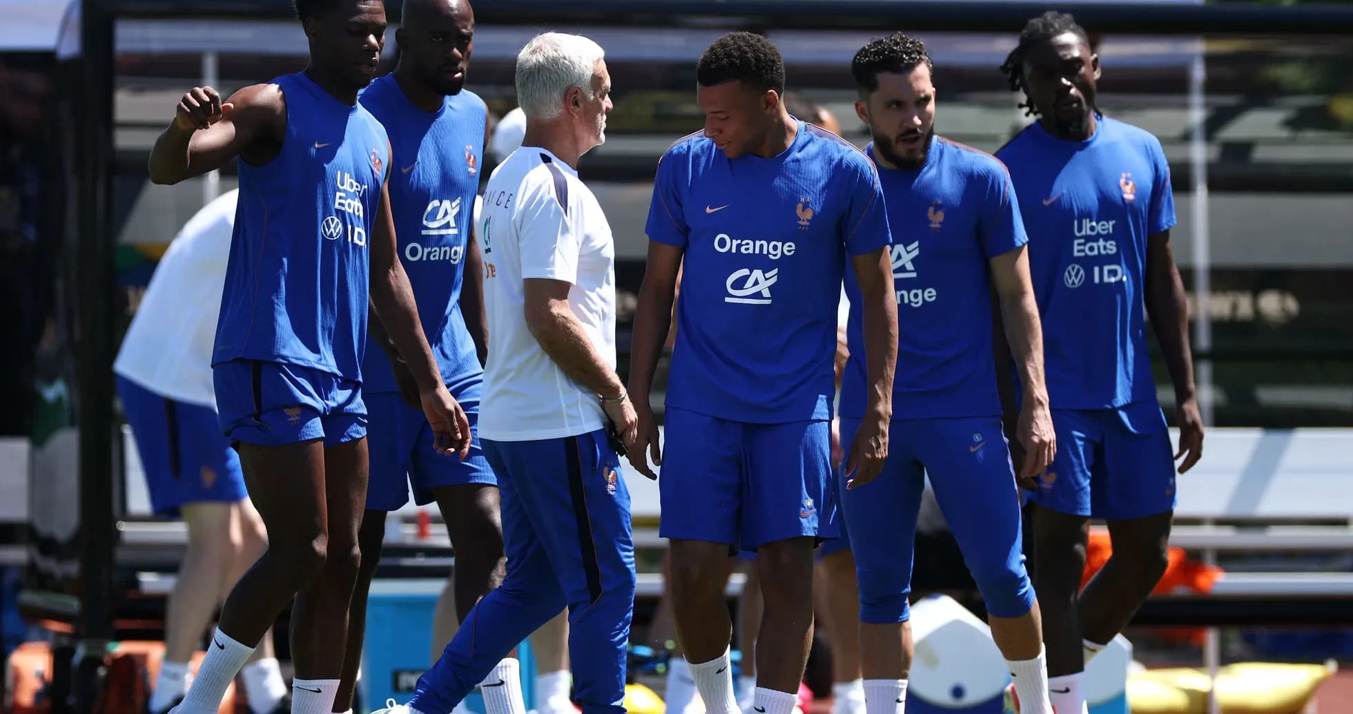 French team training session with players and coach