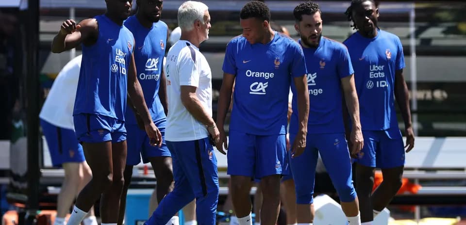 French team training session with players and coach