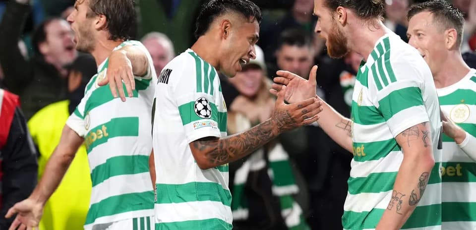 Celtic players celebrating during UEFA Champions League match