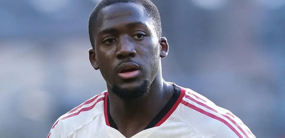 Player in white jersey during match