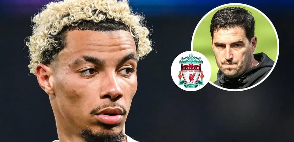 Football player with curly hair, Liverpool logo in background