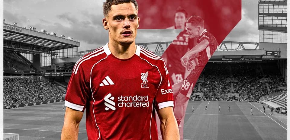 Player in Liverpool jersey at Anfield stadium