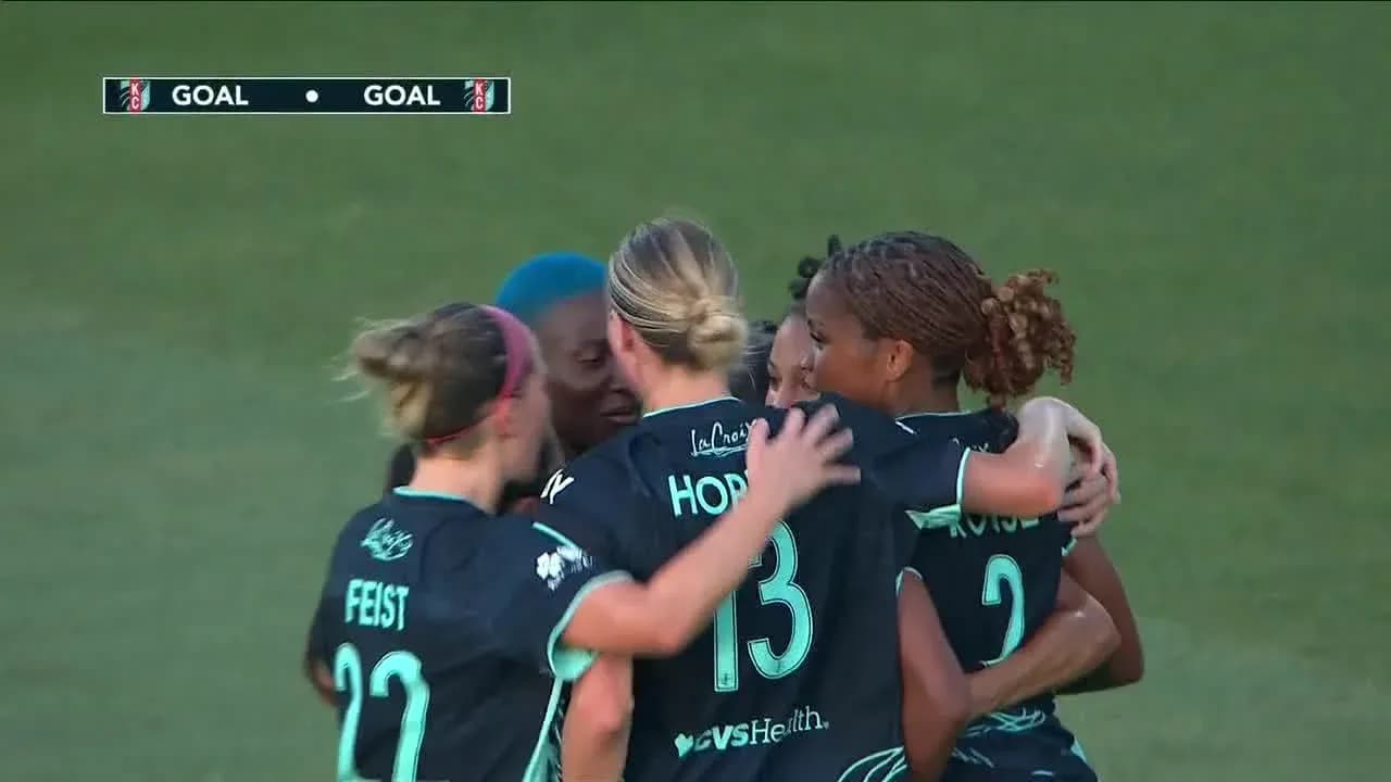 Players celebrating after scoring a goal