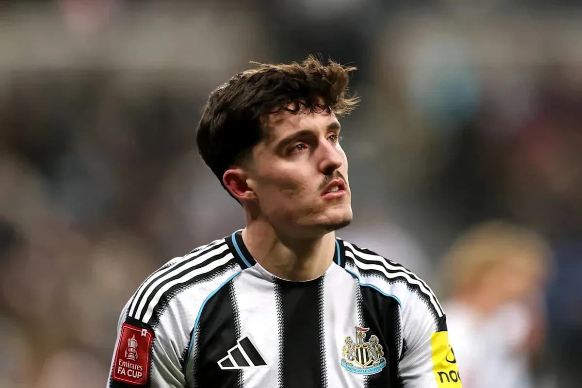 Newcastle player in home kit during match