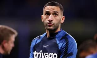 Player in blue training gear during warm-up session