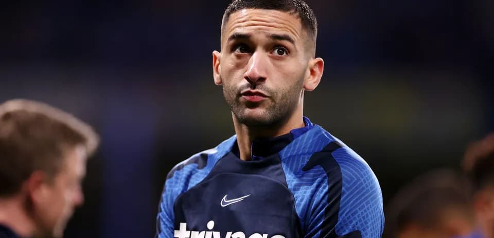 Player in blue training gear during warm-up session