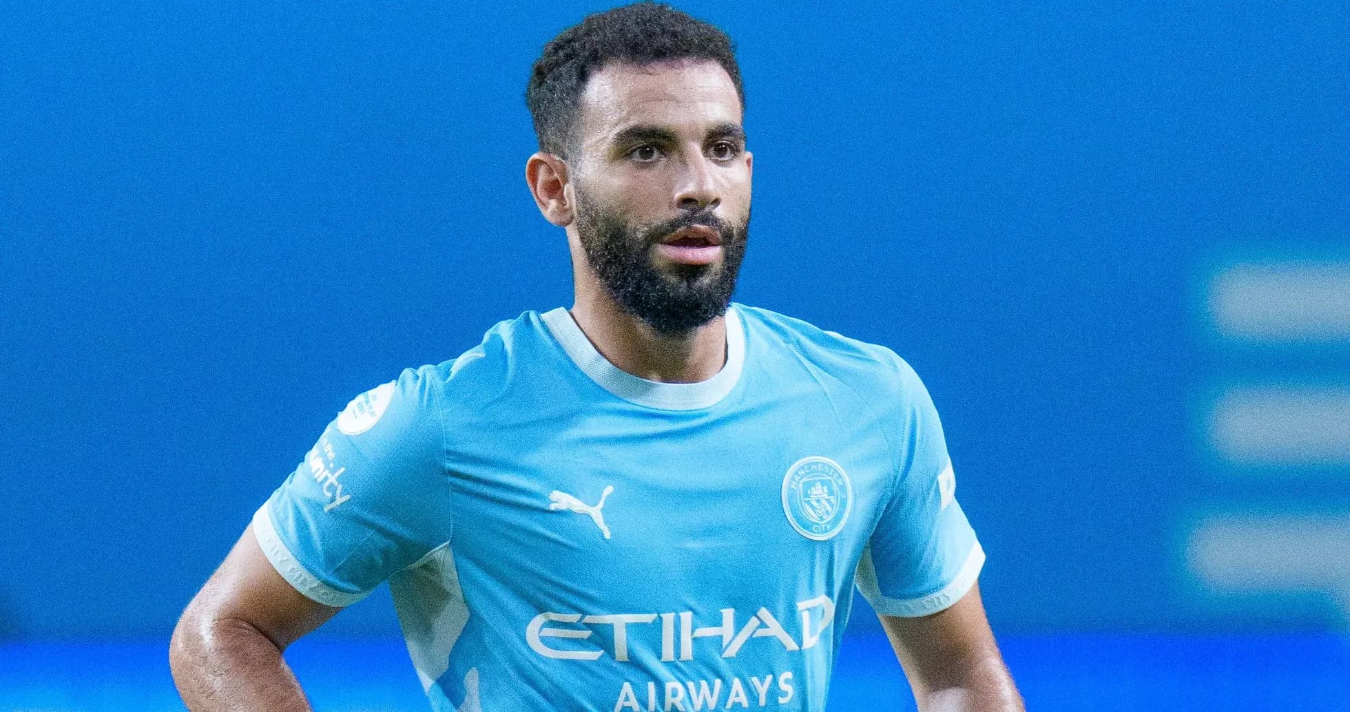 Player wearing Manchester City kit during match