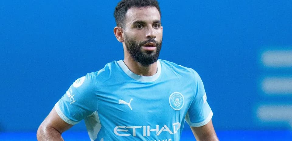 Player wearing Manchester City kit during match