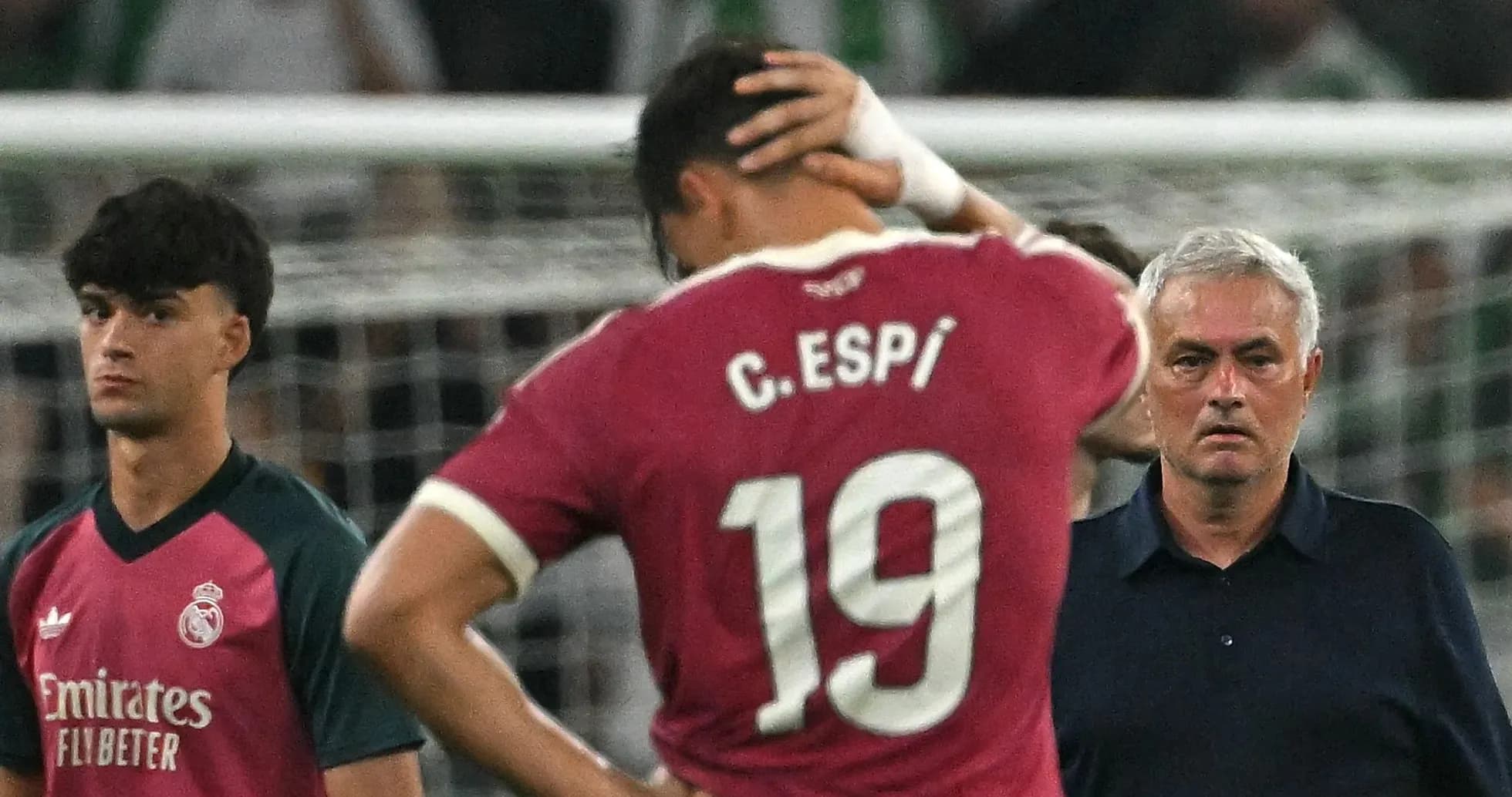 Players and coach during match aftermath