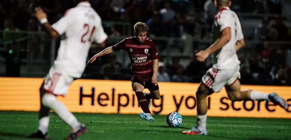 Player dribbling the ball during match
