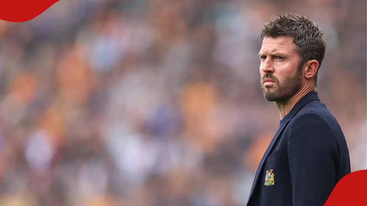 Manager observing match from the sidelines