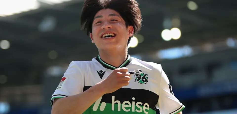 Player celebrating with a smile after scoring