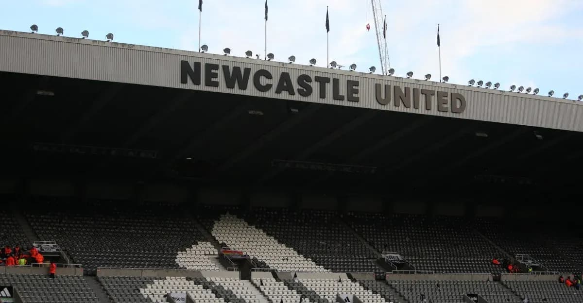 Newcastle United stadium with empty seats and signage