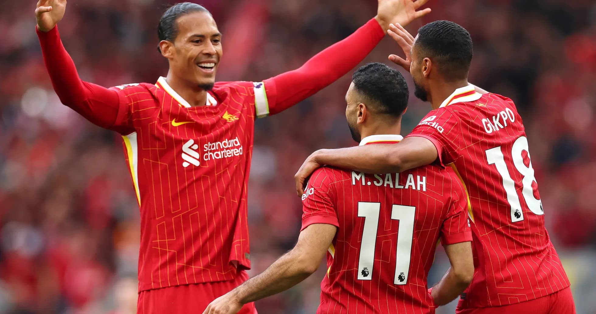 Liverpool players celebrating a goal during match