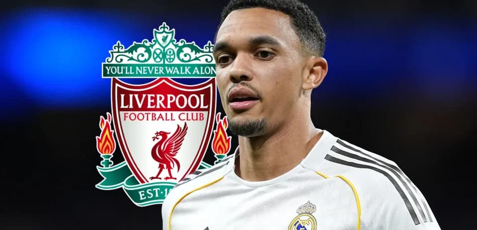 Player in white jersey with Liverpool logo background