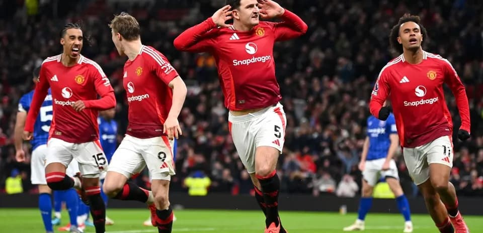 Manchester United players celebrating a goal