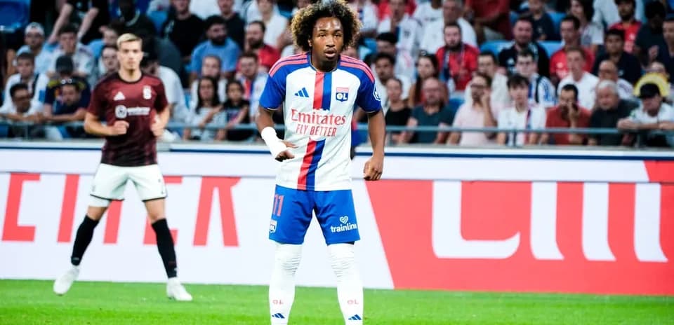 Player wearing Olympique Lyonnais jersey during match