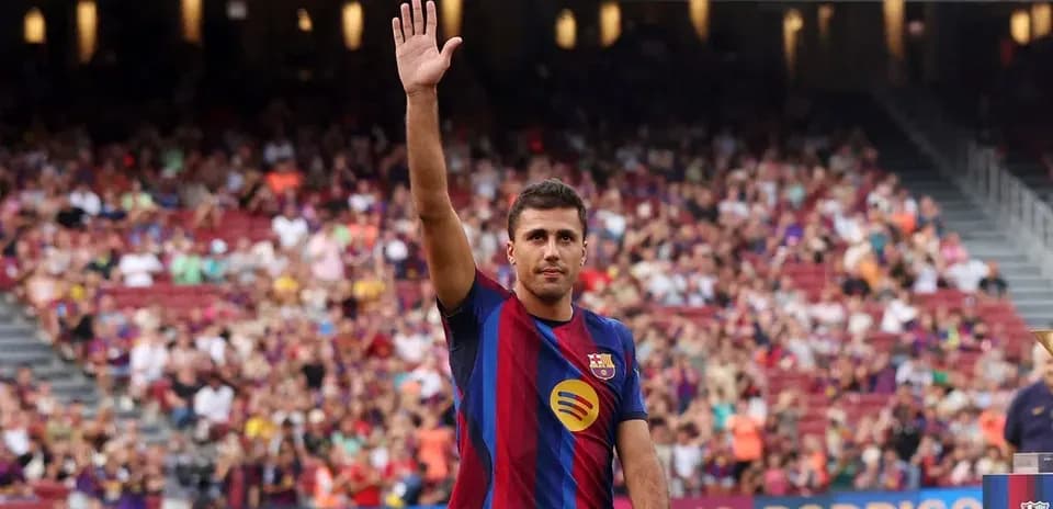 Player waving during presentation at stadium