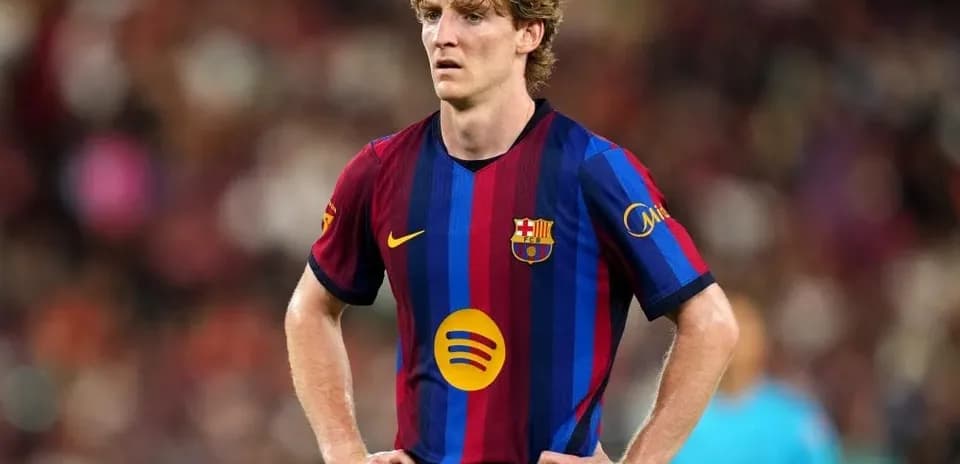 Barcelona player standing on the pitch during match