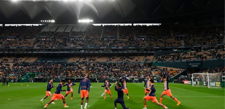 Players warming up before Real Betis match