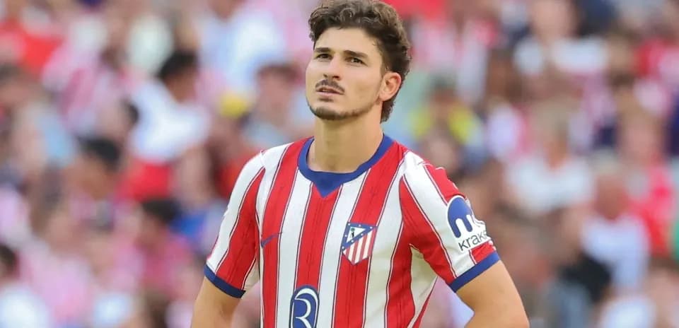 Atletico Madrid player looking up during match