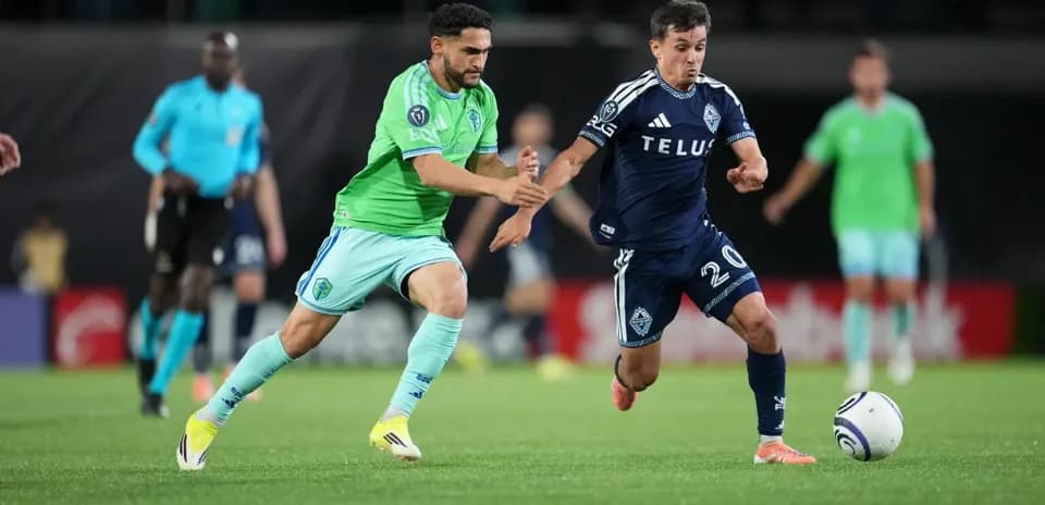 Seattle Sounders player challenges Vancouver Whitecaps player