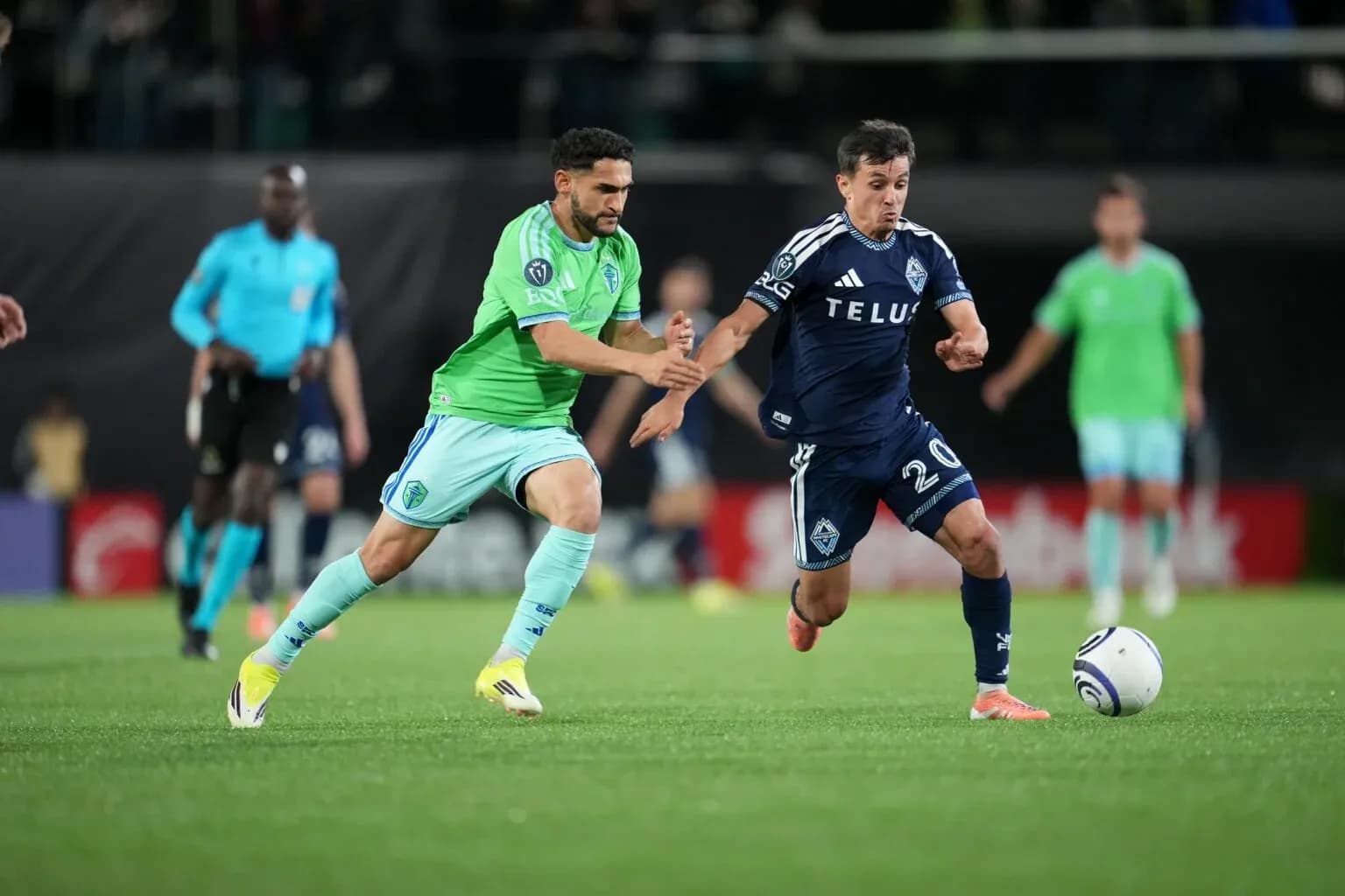 Seattle Sounders player challenges Vancouver Whitecaps player