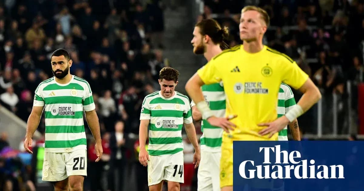 Celtic players walking off the pitch after match
