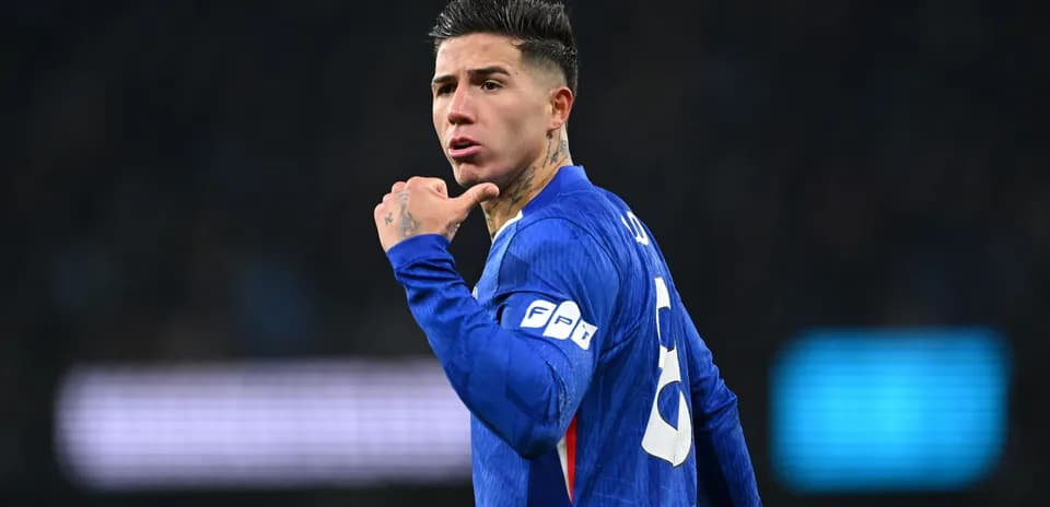 Player gesturing during football match on field