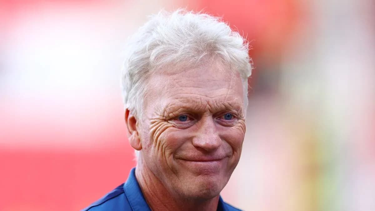 Coach smiling before the match at stadium