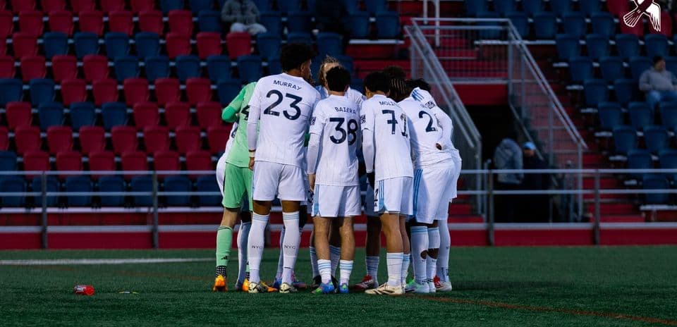New York City II players huddling before match