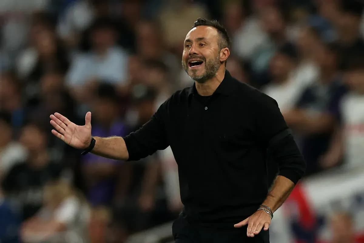 Coach gesturing during a match from the sidelines