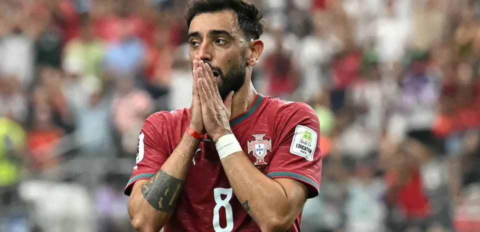 Player in Portugal jersey with hands clasped in front