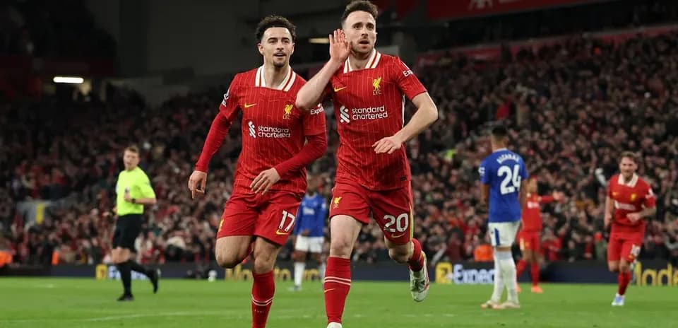 Liverpool players celebrating during Everton match