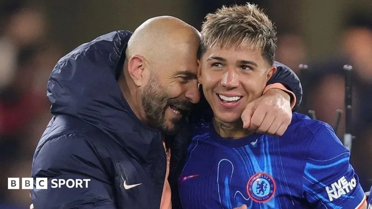 Coach celebrating with player after match victory
