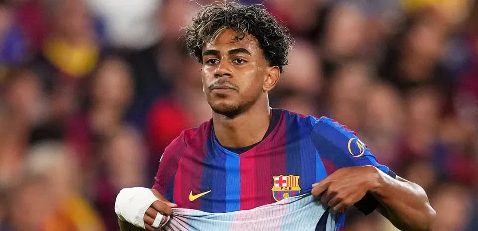 Player pulling up Barcelona jersey during match