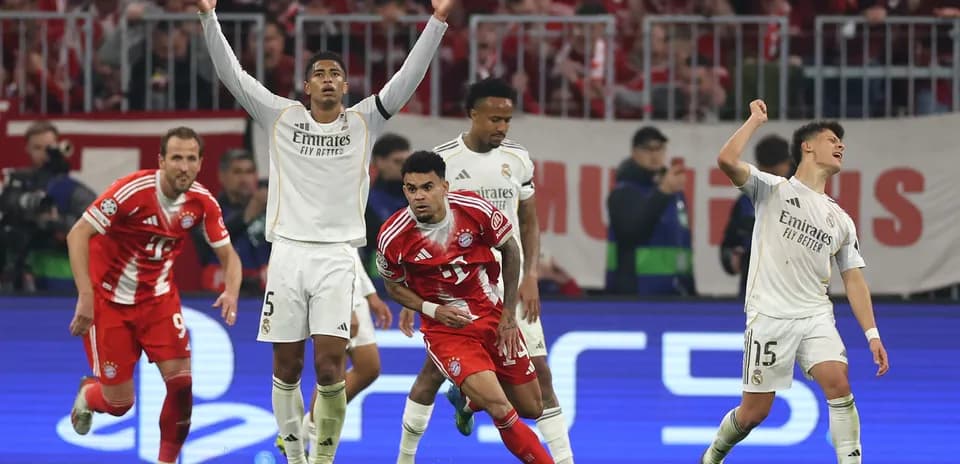 Players celebrating during Bayern vs Real Madrid match