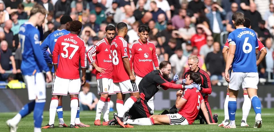 Player receiving medical attention on the field