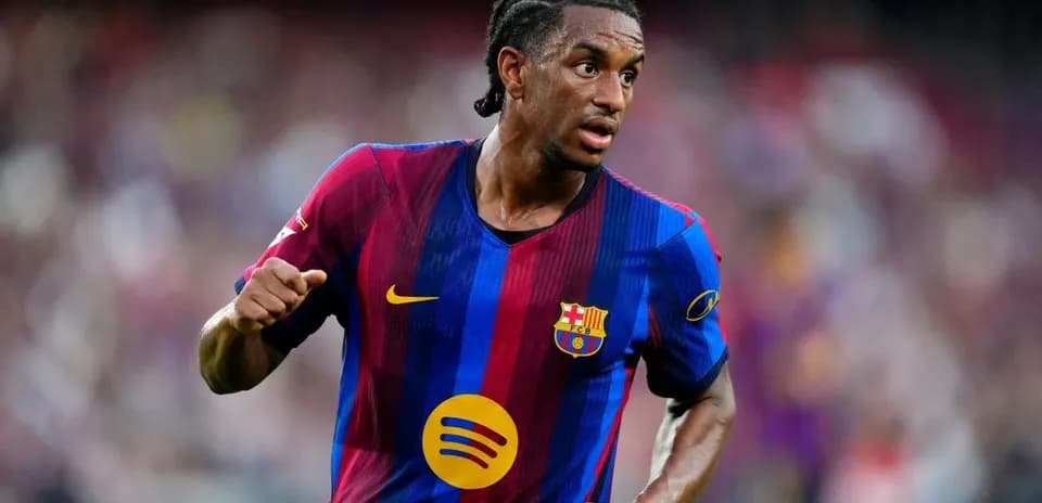 Football player wearing FC Barcelona jersey during match