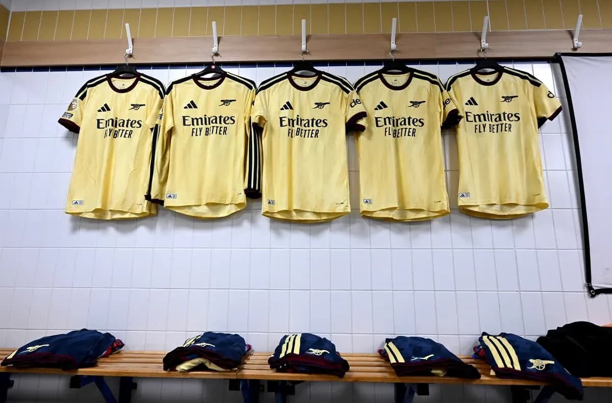 Arsenal jerseys hanging in the locker room