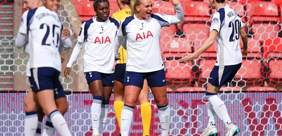 Tottenham players celebrating a goal during match